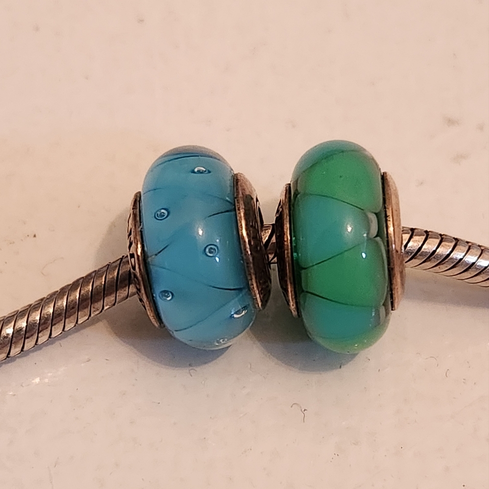 Two Pandora Murano beads